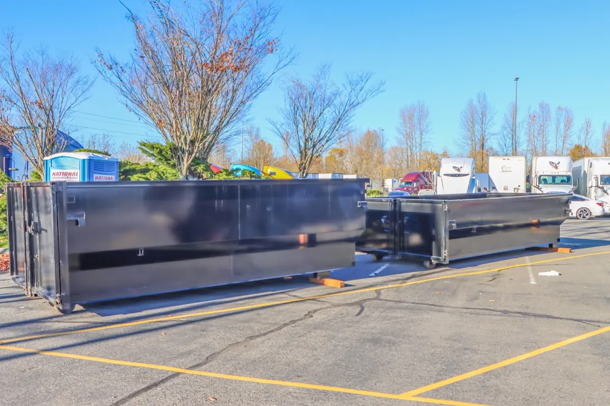 Professional dumpster rental service with roll-off container on residential driveway in Canonsburg